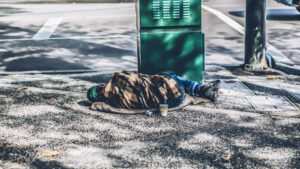 Homeless person sleeping on street