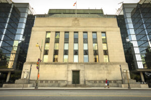 Majority of Canadians expect interest rates to hold or decrease over the next year. (Bloomberg/Nanos)